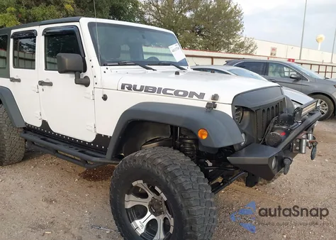 2011 Jeep Wrangler Unlimited Rubicon из США, поврежденный, VIN 1J4BA6H10BL536027